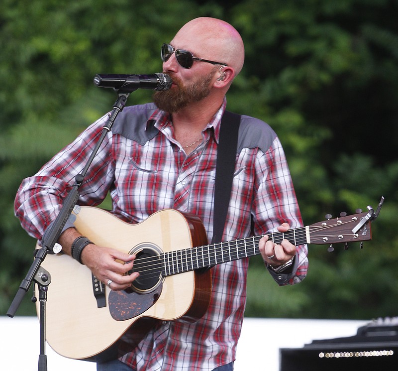 Corey Smith and his band play on the Bud Light Stage during the Riverbend Music Festival in this June 13, 2014, file photo.
