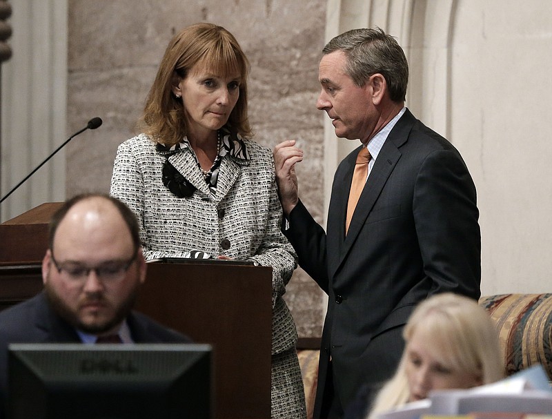 House Speaker Beth Harwell, R-Nashville, left, talks with Rep. Glen Casada, R-Franklin, right, Monday, April 6, 2015, in Nashville, Tenn. 
            