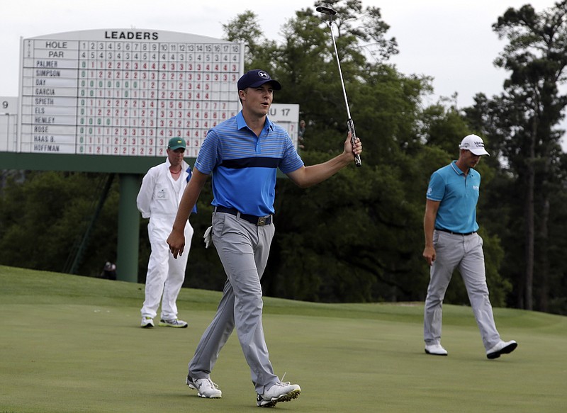 Jordan Spieth reacts after his birdie on the 18th hole during the first round of the Masters golf tournament Thursday, April 9, 2015, in Augusta, Ga.