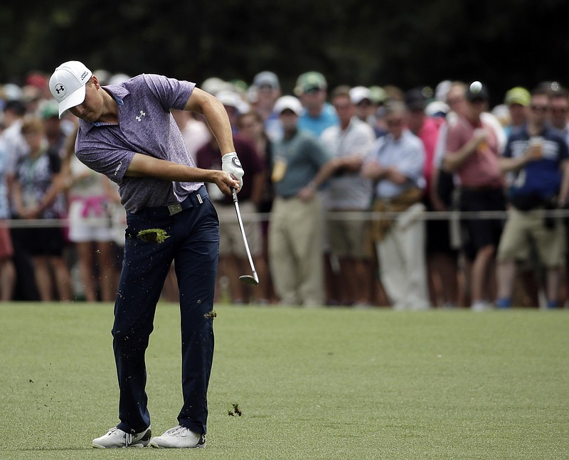 Jordan Spieth hits on the 15th fairway during the second round of the Masters golf tournament Friday, April 10, 2015, in Augusta, Ga.