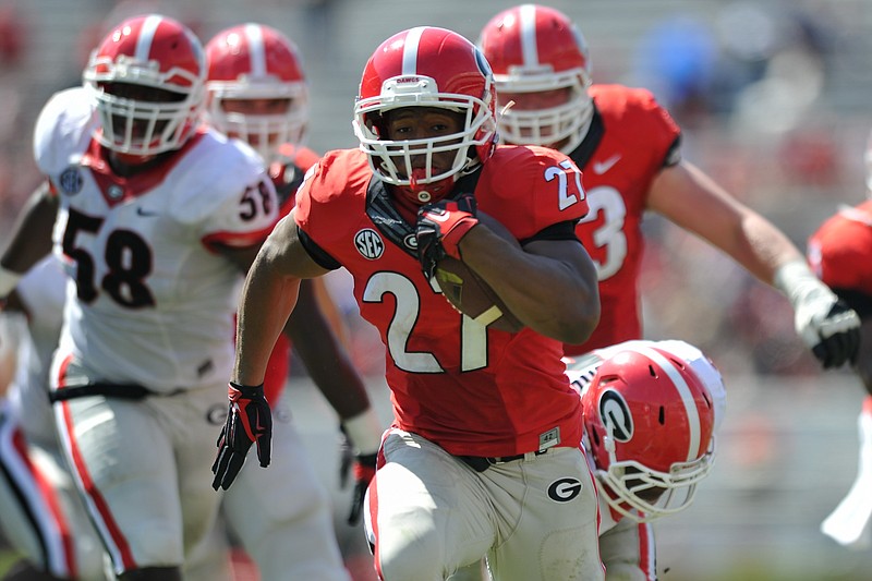 Red team's Nick Chubb runs for a touchdown during Georgia's spring NCAA college football game Saturday, April 11, 2015, in Athens, Ga. 