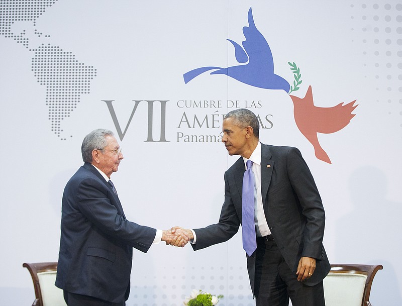 U.S. President Barack Obama and Cuban President Raul Castro shake hands at the Summit of the Americas in Panama City, Panama, Saturday, April 11, 2015. 