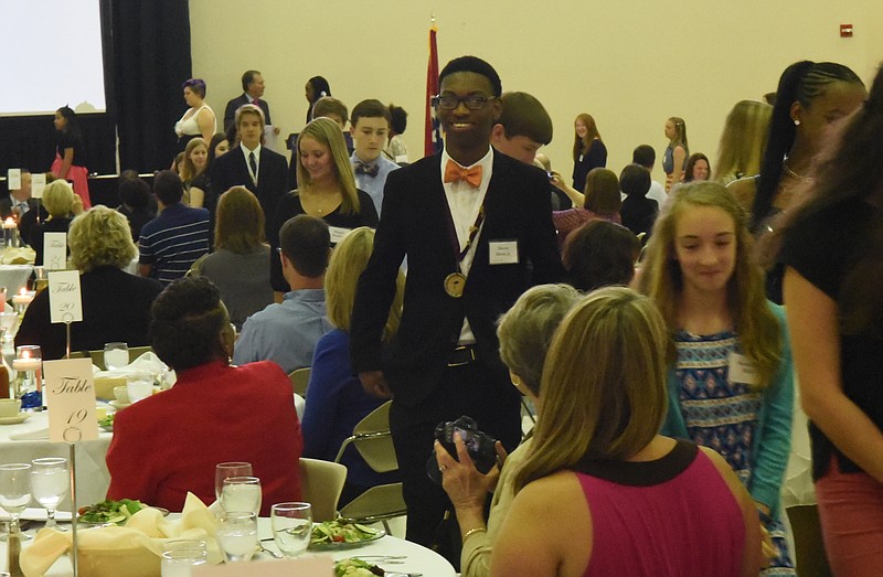 Students enter the Carson Scholars Fund awards banquet at the University of Tennessee at Chattanooga on Sunday, April 12, 2015.