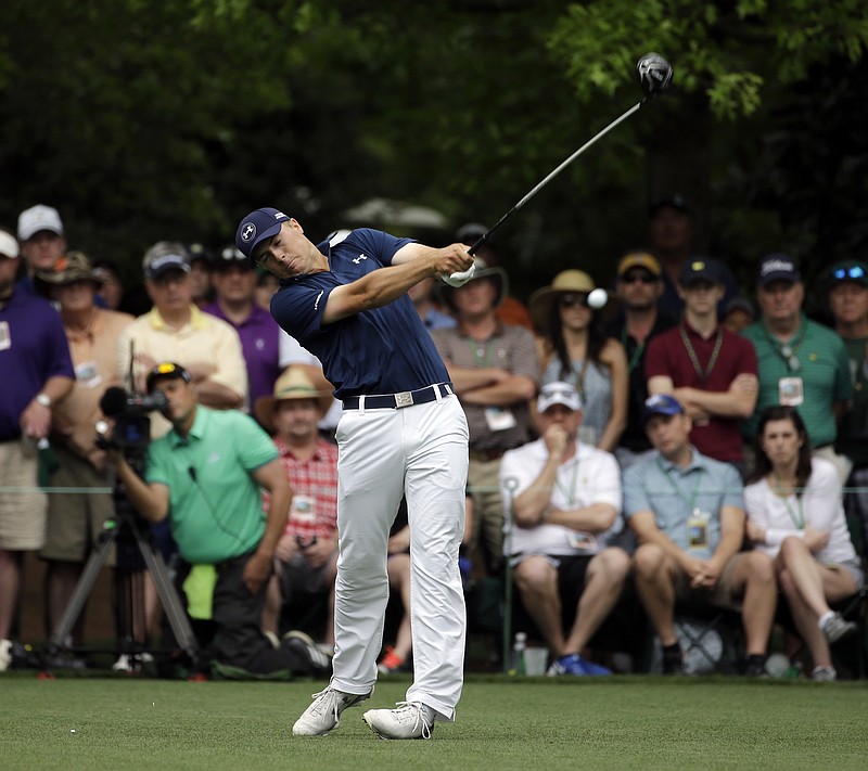 Jordan Spieth tees off the seventh hole during Masters golf tournament Sunday, April 12, 2015, in Augusta, Ga.
