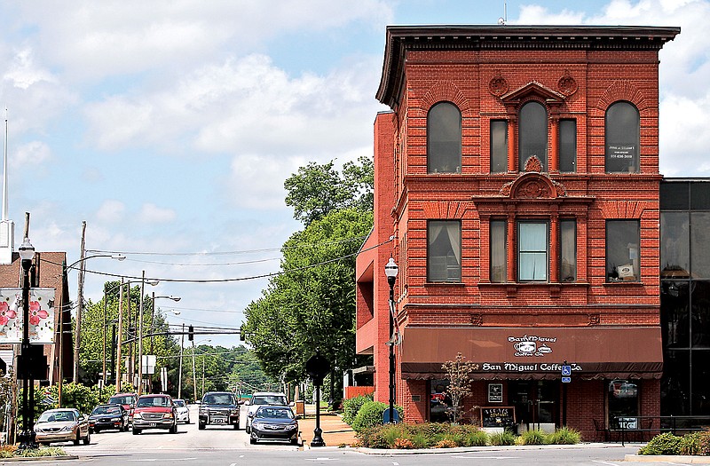 Motorists pass the San Miguel Coffee Co. while entering the square in downtown Winchester, Tenn. First Avenue SW is part of the next phase of revitalization work.