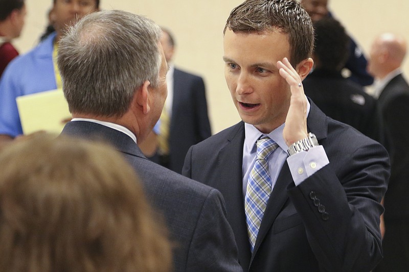 Matt McCall mingles after being announced as the University of Tennessee at Chattanooga's head men's basketball coach on  April 14, 2015, at the UTC University. 