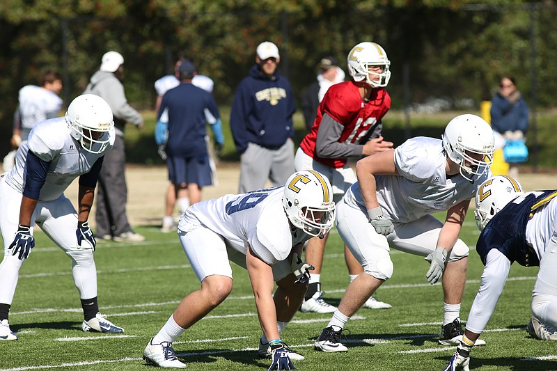 Steve Pickren, front center, participates in Chattanooga Mocs football practice.