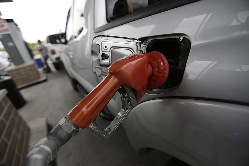 
              FILE - In this April 6, 2015 file photo, a vehicle is refueled at a gas station in New Orleans. Rising gas prices in March led to a slight increase in inflation, a sign that some of the broader economic impact from cheaper oil is fading. The Labor Department says the consumer price index rose 0.2 percent in March. Inflation moved at that same pace in February, which ended three straight monthly declines caused largely by falling oil and gasoline prices. (AP Photo/Gerald Herbert)
            