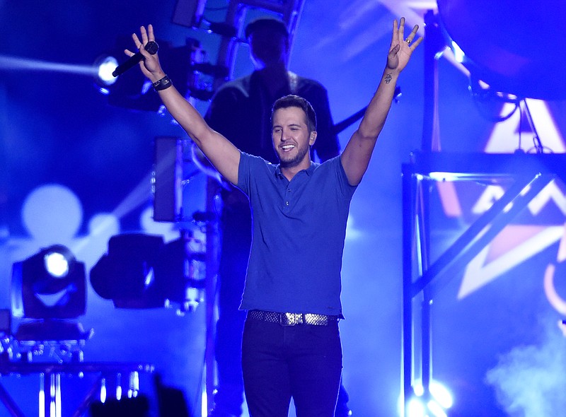 Luke Bryan performs at the 50th annual Academy of Country Music Awards at AT&T Stadium on Sunday, April 19, 2015, in Arlington, Texas. 