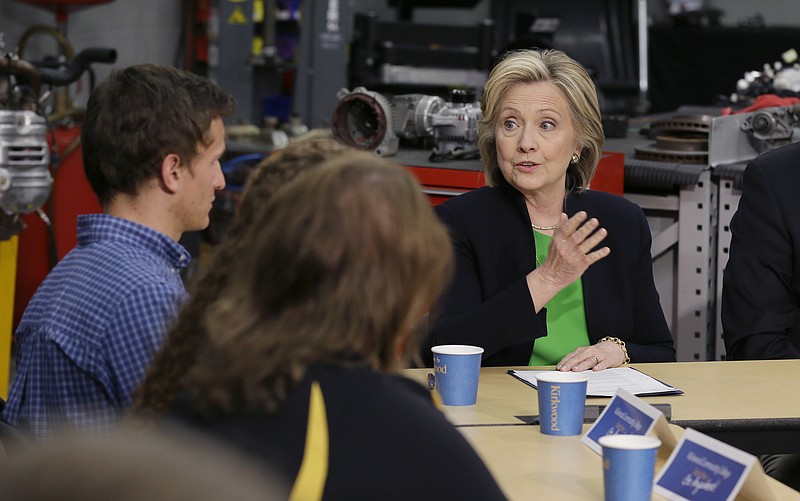 Democratic presidential candidate Hillary Rodham Clinton, right, participates in a roundtable with educators and students at the Kirkwood Community College's Jones County Regional Center in Monticello, Iowa, in this April 14, 2015, photo.