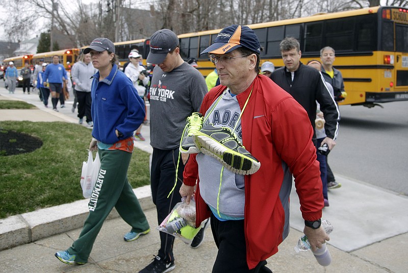 The Latest Runners pack Boston Marathon athletes village Chattanooga