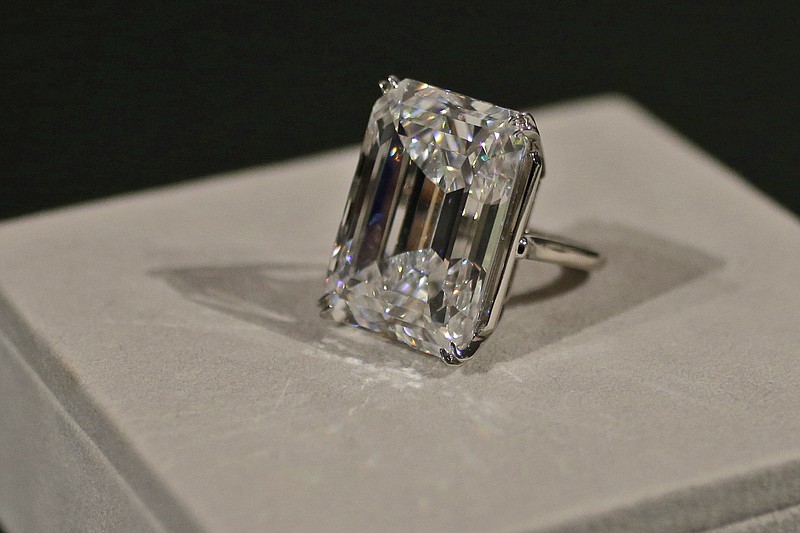 
              A 100-carat emerald-cut diamond is on display at Sotheby's, Friday, April 17, 2015, in New York. The "perfect" 100-carat diamond in a classic emerald cut is going on the auction block, where it could fetch between $19 million to $25 million. Sotheby's will offer the white diamond on April 21, in New York.  (AP Photo/Mary Altaffer)
            