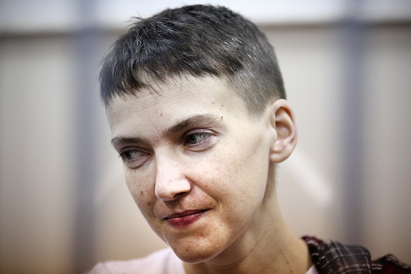 
              FILE - In this March 26, 2015, file photo, Ukrainian jailed military officer Nadezhda Savchenko attends a court hearing in Moscow. Maria Shavchenko, the mother of a Ukrainian helicopter pilot imprisoned in Russia is on a global campaign seeking support from world leaders to pressure President Vladimir Putin to free her daughter, Nadezhda Savchenko. Maria Shavchenko said in an interview with The Associated Press on Monday, April 20, 2015, that her daughter is a political prisoner and Russian prosecutors have provided "no evidence" that she provided guidance for a mortar attack that killed two Russian state TV journalists at a checkpoint in eastern Ukraine, as Moscow claims.  (AP Photo/Maxim Chernavsky, File)
            