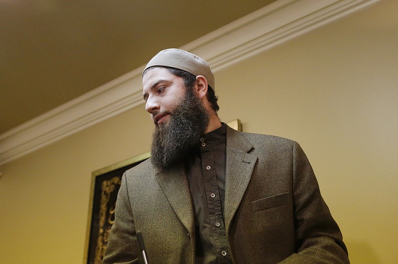 Attorney Hassan Shibly stands after speaking to the media at a mosque on behalf of the parents of the 20-year-old ISIS militant recruit Monday, April 20, 2015, in Hoover, Ala.