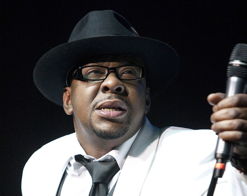 In this Feb. 18, 2012, file photo, singer Bobby Brown, former husband of the late Whitney Houston performs with New Edition at Mohegan Sun Casino in Uncasville, Conn.