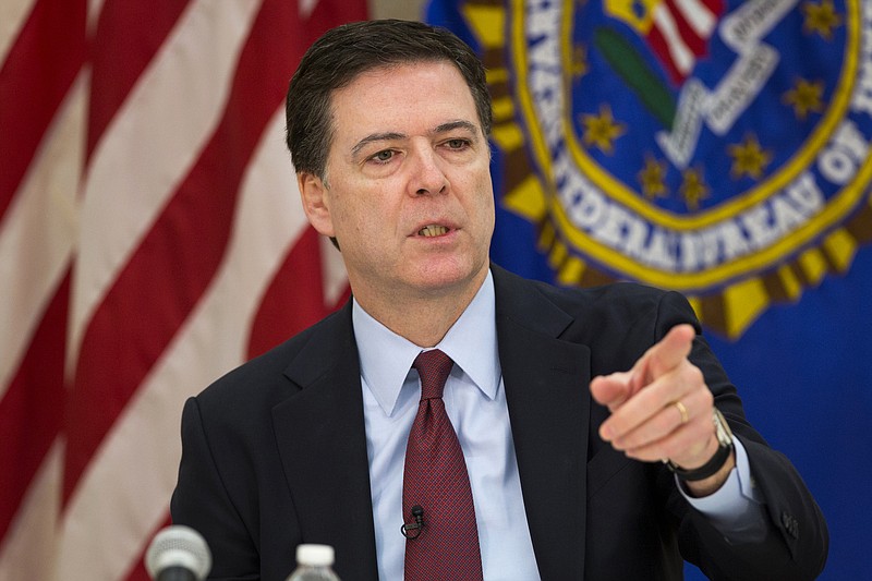 
              FILE - This is a Wednesday, March 25, 2015  file photo of FBI director James Comey as he gestures during a news conference at FBI headquarters in Washington.  FBI director Comey  has caused huge offense to a U.S. ally: using language to suggest that Poles were accomplices in the Holocaust. On Monday, April 20, 2015  Poles were waiting to see if FBI director James Comey apologizes _ something Polish Foreign Minister Grzegorz Schetyna said he expected so the matter can be settled. (AP Photo/ Evan Vucci, File)
            