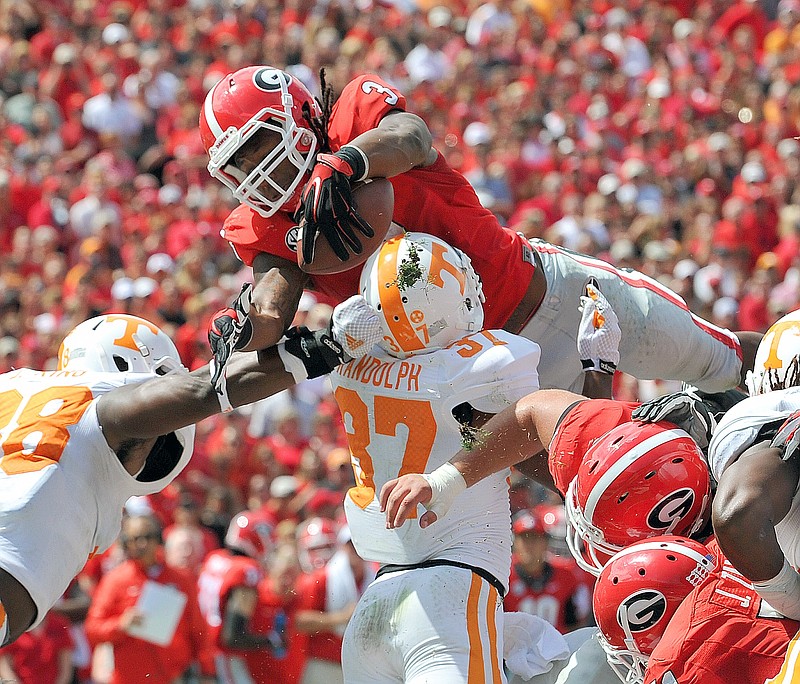 Former Georgia tailback Todd Gurley, shown here in last season's win over Tennessee, has vaulted up the various NFL draft projections in recent days.