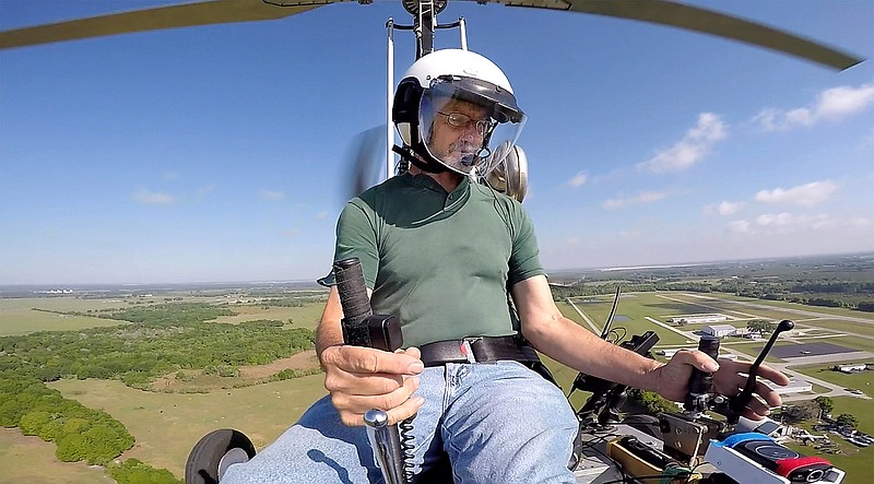 Doug Hughes flies his gyrocopter near the Wauchula Municipal Airport in Wauchula, Fla., in this March, 2015, photo.