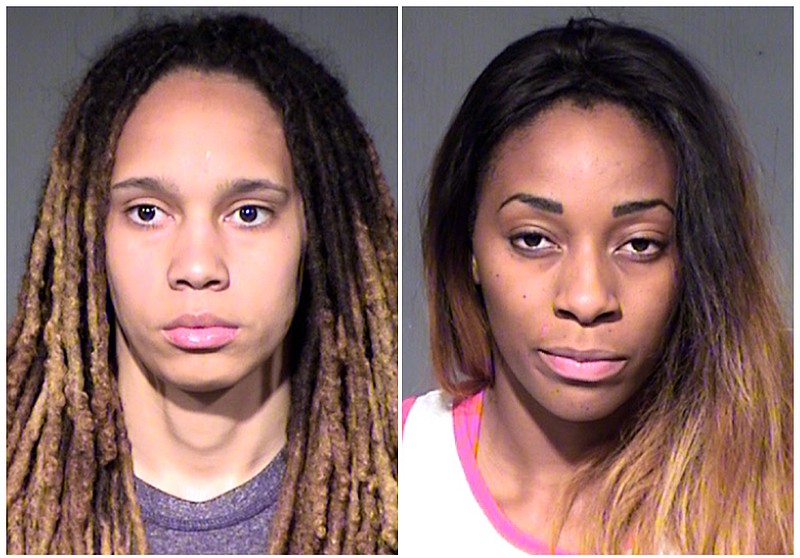 This combo of booking photos released by the Maricopa County Sheriff's Office, show WNBA players Brittney Griner, left, and her fiancee Glory Johnson. The couple were arrested Wednesday, April 22, 2015, on suspicion of assault and disorderly conduct following a fight at their home in a Phoenix suburb.
