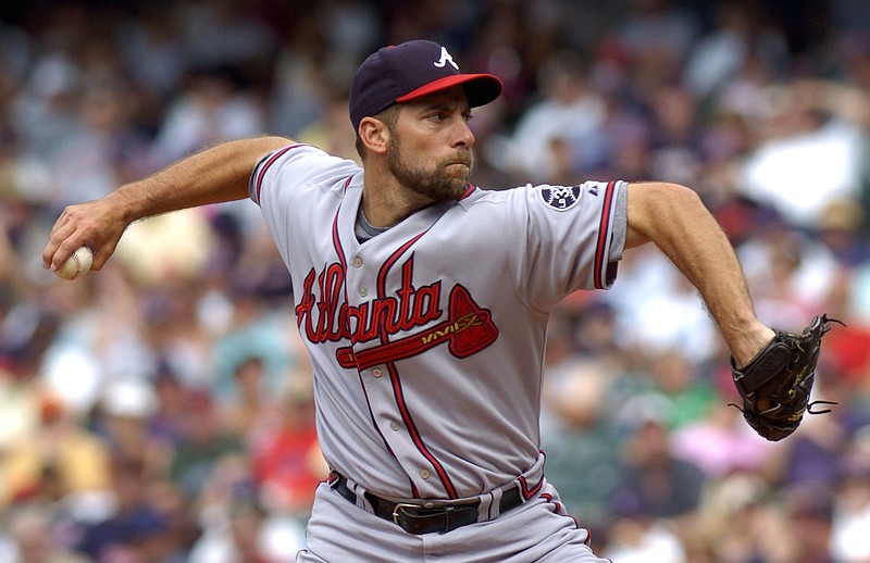 Atlanta Braves pitcher John Smoltz throws to Cleveland Indians' Grady Sizemore in this 2007 file photo.