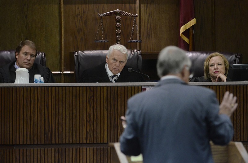 Judges Barry Steelman, Don Poole and Rebercca Stern, from left, hear a case from Jerry Summers Friday at the City-County Courts building in this 2014 file photo.