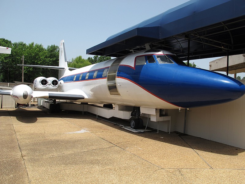 
              FILE - This July 1, 2014, file photo shows the Hound Dog II, one of two jets once owned by late singer Elvis Presley on display at Graceland in Memphis, Tenn.  It looks like Elvis Presley's airplanes are staying at Graceland after all. Graceland released a statement Sunday, April 26, 2015, saying the Lisa Marie and the Hound Dog II, two custom-designed airplanes once owned by Presley, will permanently remain at the Memphis tourist attraction centered on the life and career of the late singer.(AP Photo/Adrian Sainz, File)
            