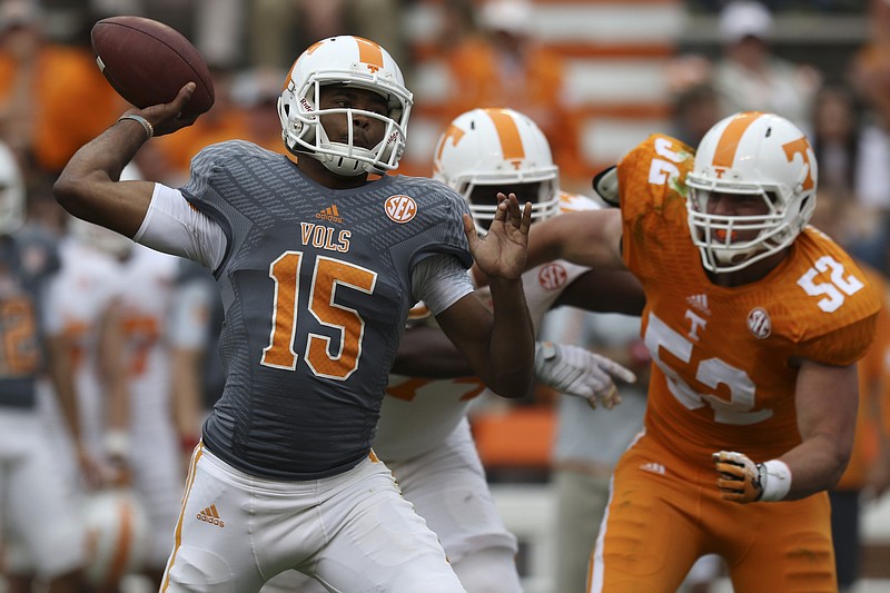The University of Tennessee's Jauan Jennings (15) looks for an open teammate during the Dish Orange & White Game in Knoxville on Saturday, April 25, 2015. Final score was Orange 54, White 44.