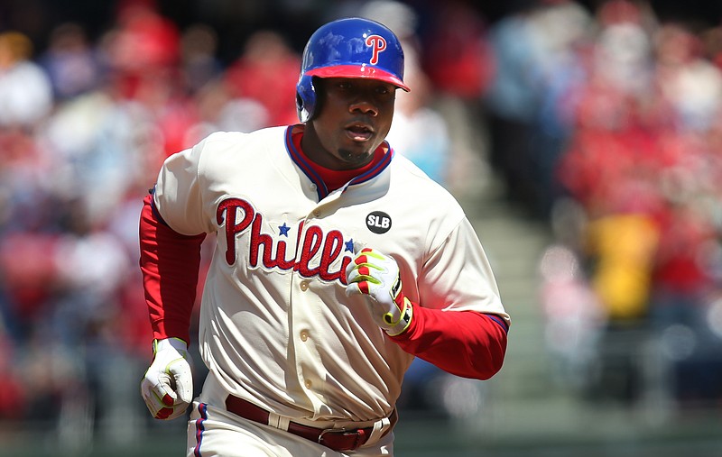 Philadelphia Phillies' Ryan Howard rounds the bases after hitting a home run in his game against the Atlanta Braves, Sunday, April 26, 2015, in Philadelphia. The Phillies won 5-4. 