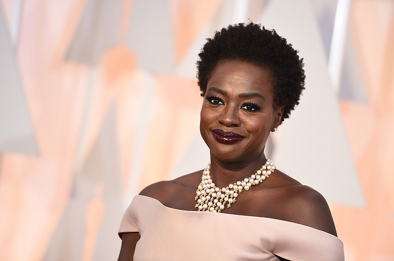 
              FILE - In this Feb. 22, 2015 file photo, Viola Davis arrives at the Oscars at the Dolby Theatre in Los Angeles. "How to Get Away with Murder" star Davis will play Harriet Tubman in a HBO movie about the abolitionist hero. HBO said Monday, April 27, 2015, that the project is based on the biography "Bound for the Promised Land: Harriet Tubman," by historian Kate Clifford Larson. (Photo by Jordan Strauss/Invision/AP, File)
            