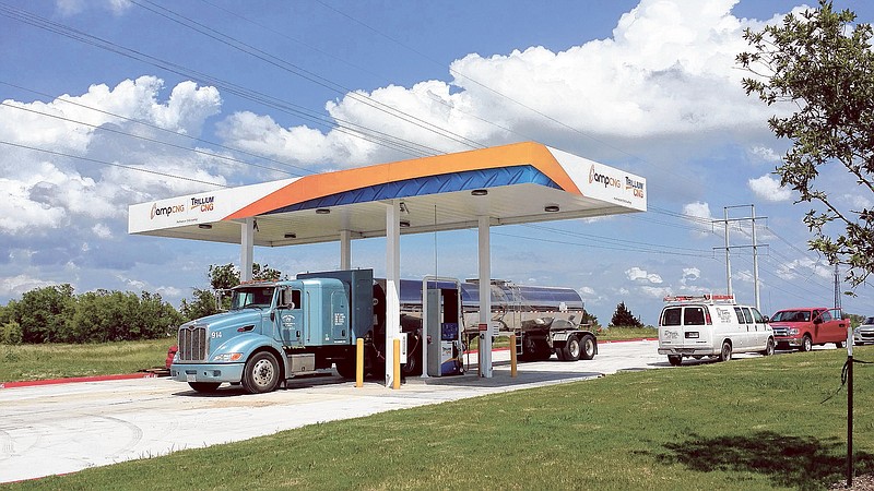 A semi truck is refueled at a ampCNG plant in Waco, Texas, similar to one that will be built this summer in Dalton, Ga.