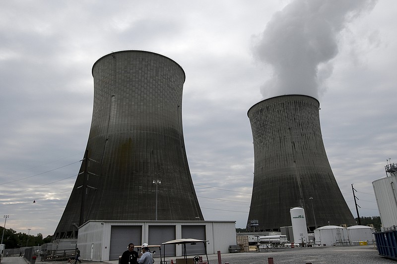 The cooling towers of TVA's Watts Bar nuclear plant are seen Wednesday, April 29, 2015, in Spring City, Tenn. TVA plans for the nuclear plant's second reactor unit to come online by the end of the year.