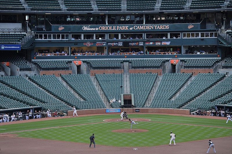
              The Baltimore Orioles bat against the Chicago White Sox during a baseball game without fans Wednesday, April 29, 2015, in Baltimore. Due to security concerns the game was closed to the public. (AP Photo/Gail Burton)
            