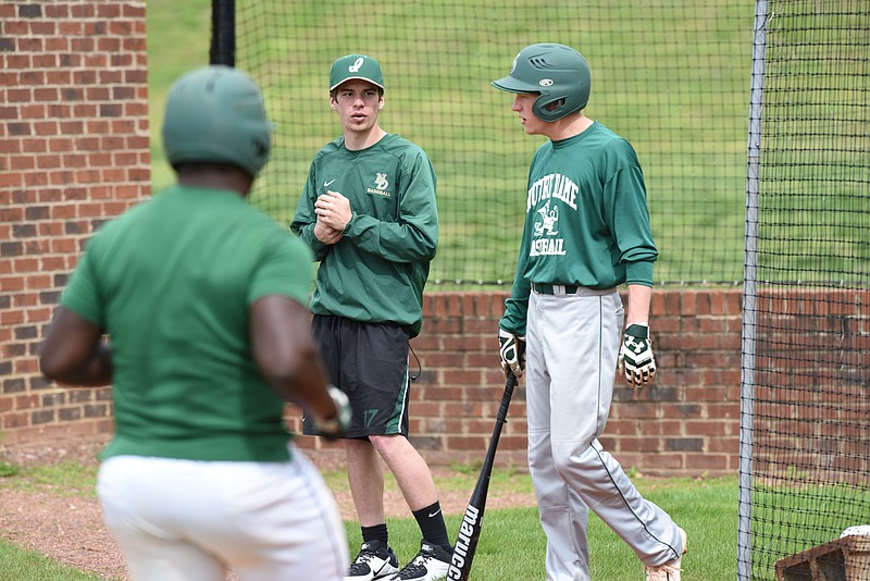 Gage Miller, senior pitcher/center fielder for Notre Dame, hangs with the team April 29, 2015, as he recovers from surgery.