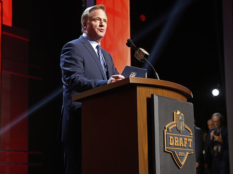 NFL commissioner Roger Goodell announces after the Tampa Bay Buccaneers selects Florida State quarterback Jameis Winston as the first pick in the first round of the 2015 NFL Draft on Thursday, April 30, 2015, in Chicago. 