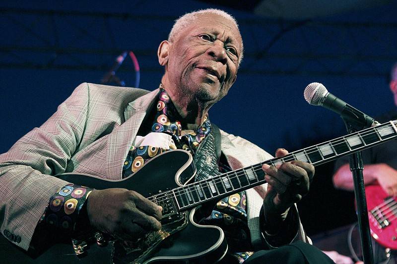 B.B. King performs at the 32nd annual B.B. King Homecoming, a concert on the grounds of an old cotton gin where he worked as a teenager in Indianola, Miss., in this 2012 file photo.