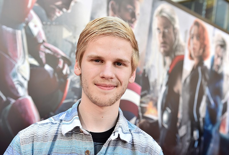 
              In this Monday, April 13, 2015 photo, blogger Reid Jones poses for a portrait at the premiere for “Avengers: Age of Ultron,” in Los Angeles. Jones is possibly the world’s biggest Marvel movie fan. For the last year, he’s written more than a post a day for fan site MoviePilot.com about its superhero universe.  (Photo by Jordan Strauss/Invision/AP)
            