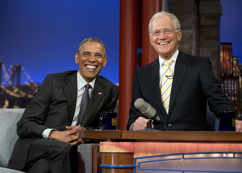 
              President Barack Obama with host David Letterman smile during a break at a taping of CBS The Late Show with David Letterman at the Ed Sullivan Theater in New York, Monday, May 4, 2015. Obama traveled to New York to announced the creation of an independent nonprofit organization that is a spin off his "My Brother's Keeper" program, to tape a segment on Letterman's show and to do fundraising for the Democratic party. (AP Photo/Pablo Martinez Monsivais)
            
