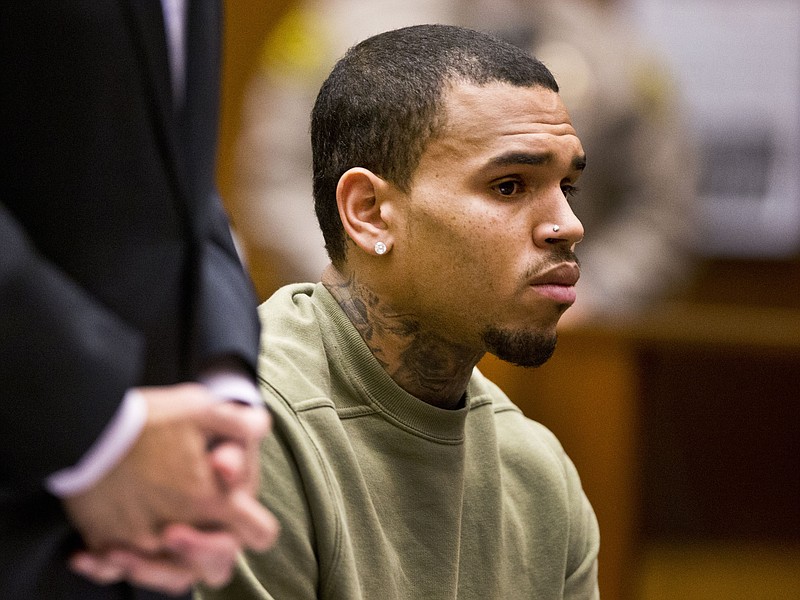 In this Jan. 15, 2015, file photo, R&B singer Chris Brown appears in Los Angeles Superior Court in Los Angeles. Brown faces another battery accusation just days after he performed in Las Vegas over the weekend.