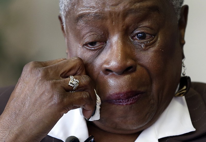
              Brenda Stewart wipes away tears Monday, May 4, 2015, in Clayton, Mo., as she recounts the story of how she was told her child had died shortly after giving birth at Homer G. Phillips Hospital in St. Louis. Stewart was 16 and unmarried when she gave birth to a seemingly healthy girl on June 24, 1964, at the hospital.  A nurse took the child after birth and returned a short time later to tell Stewart that the baby had died but she now believes her baby may have been stolen and sold to adoptive parents. (AP Photo/Jeff Roberson)
            