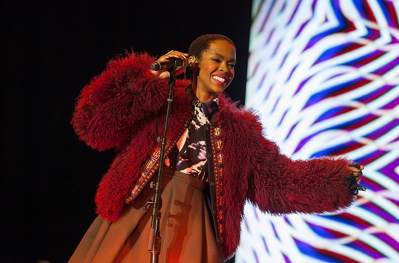 
              HOLD FOR STORY - In this Nov. 1, 2014 file photo, Lauryn Hill performs at the Voodoo Music Experience in New Orleans. Hill is canceling a planned performance in Tel Aviv because she wasn’t able to schedule a concert in the Palestinian city of Ramallah. The singer-songwriter said in a statement Monday, May 4, 2015, that she originally intended to perform in both cities in hopes of being “a presence supporting justice and peace.”  (Photo by Barry Brecheisen/Invision/AP, File)
            