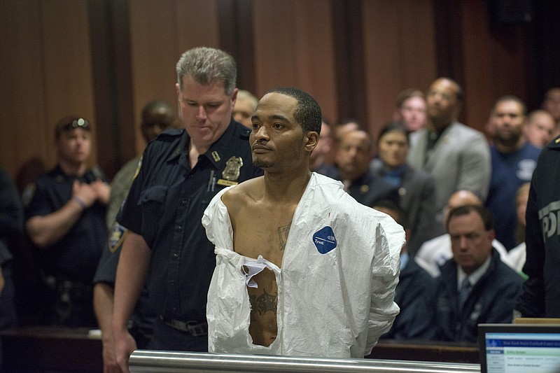 Demetrius Blackwell appears in court for his arraignment Sunday, May 3, 2015, in the Queens borough of New York. Blackwell who is accused of shooting a New York City police officer in the head was ordered held without bail Sunday on charges including attempted murder.