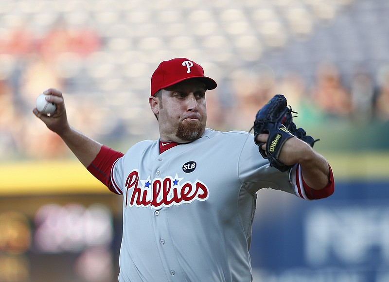 Philadelphia Phillies starting pitcher Aaron Harang works in the first inning of a baseball game against the Atlanta Braves on Monday, May 4, 2015, in Atlanta.