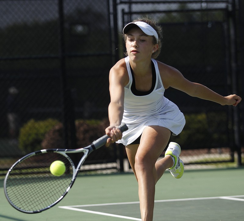 Baylor tennis player Drew Hawkins returns the ball during her Spring Fling District II-AA doubles tennis championship match with teammate Maggie Crumbliss against fellow Baylor players Samantha Caswell and McCall Morgan on Friday, May 23, 2014, in Murfreesboro.