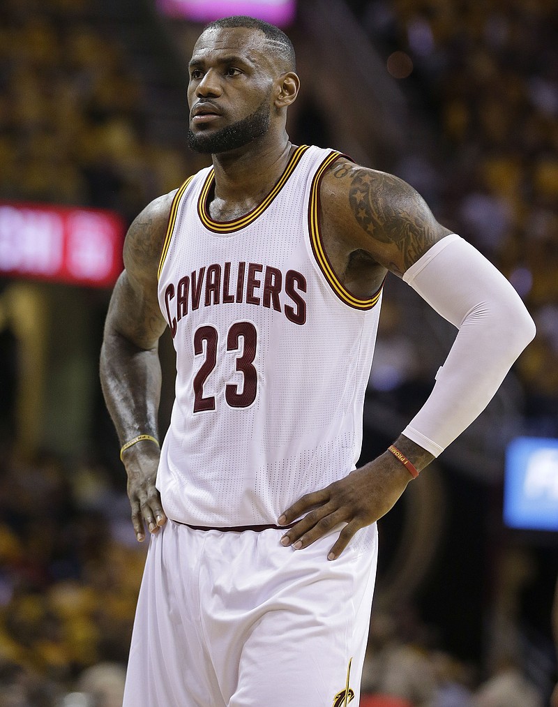 
              Cleveland Cavaliers forward LeBron James (23) takes a break during the first half of Game 1 against the Chicago Bulls in a second-round NBA basketball playoff series Monday, May 4, 2015, in Cleveland. (AP Photo/Tony Dejak)
            