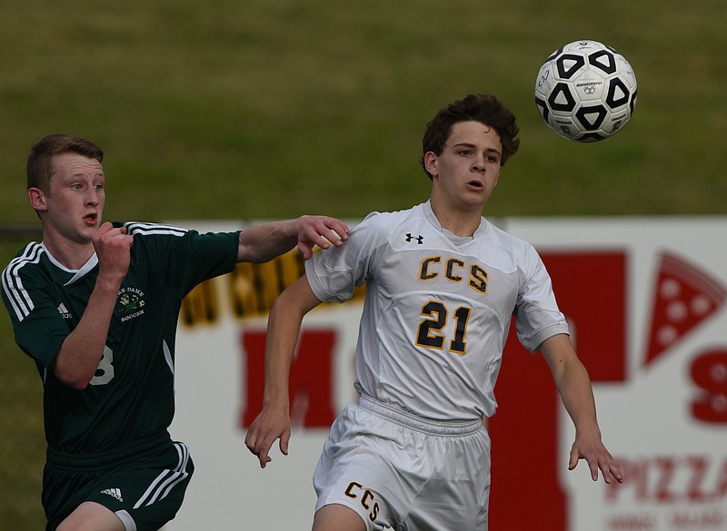 Notre Dame's Alex Tuttle, left, and Chattanooga Christian's Austin Berry eye the ball Tuesday at CCS.