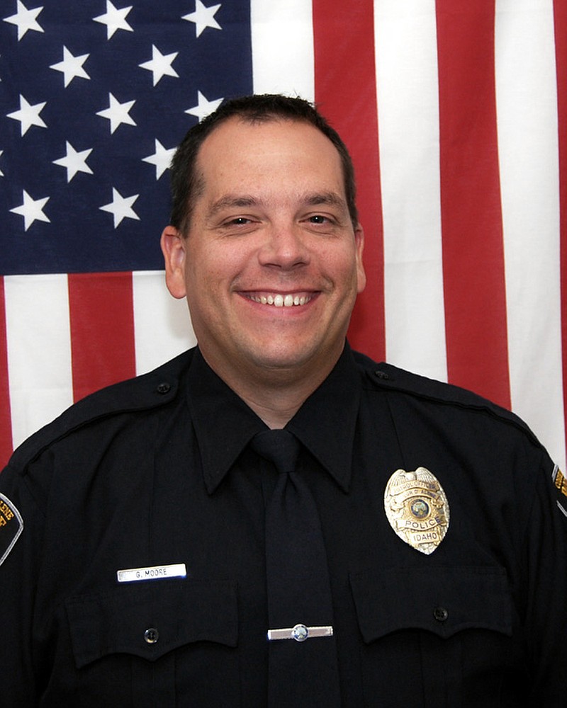 
              This undated photo provided by the Coeur d’Alene Police Department shows Coeur d’Alene, police officer Greg Moore, who was critically wounded in the line of duty in the early morning of Tuesday, May 5, 2015. The northern Idaho officer is in critical condition after being shot and a suspect is in custody. A northern Idaho police officer shot by a man who stole his patrol car died of his injuries Tuesday evening, a Coeur d’Alene, Idaho, police spokeswoman said. Sgt. Greg Moore died at 5:50 p.m. at Kootenai Health, Sgt. Christie Wood said in a statement.(Coeur d’Alene Police Department via AP)
            