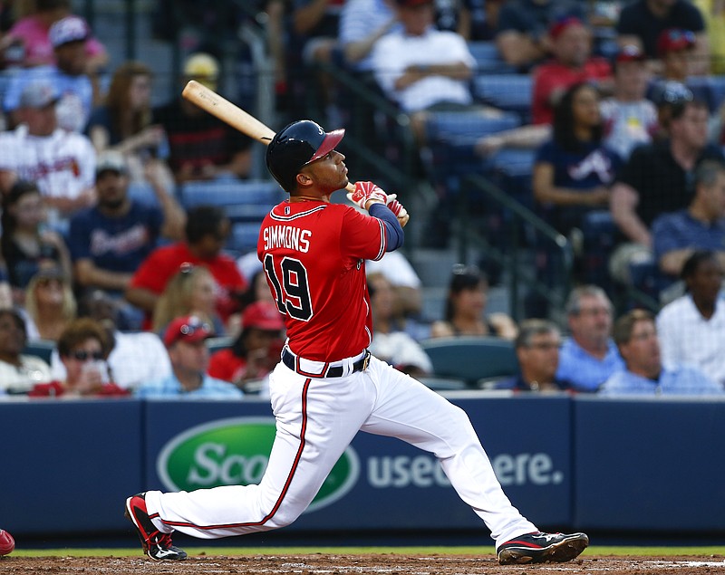 Atlanta Braves shortstop Andrelton Simmons (19) bats in a baseball game against the Philadelphia Phillies on, May 6, 2015, in Atlanta. 
