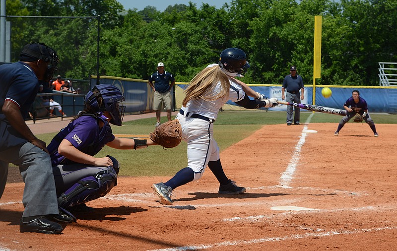 UTC batter Sara Beth Roberts makes contact as the Lady Mocs play Western Carolina in the Southern Conference women's softball tournament Thursday, May 7, 2015, at Frost Stadium in Chattanooga. UTC defeated Western Carolina 5-4 in 10 innings.