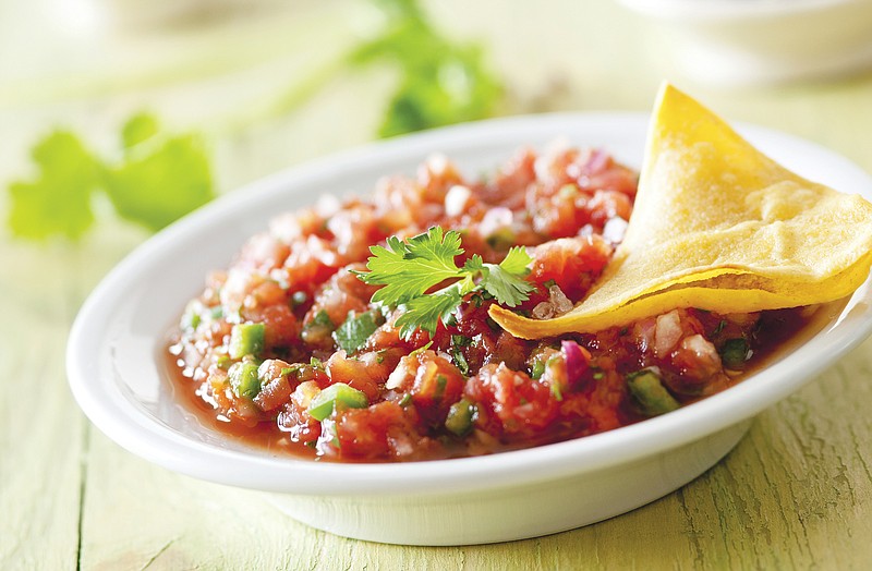 A bowl of salsa is displayed.