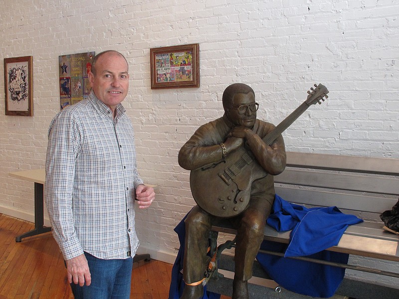 
              This April 14, 2015 photo shows Jay Sieleman, president and CEO of The Blues Foundation, next to a statue of blues musician Little Milton at the Blues Hall of Fame museum in Memphis, Tenn. The foundation raised nearly $3 million for the museum, which is set to open Friday, May 8, in Memphis. (AP Photo/Adrian Sainz)
            